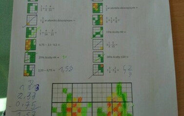 Praca ucznia z zadaniami matematycznymi.